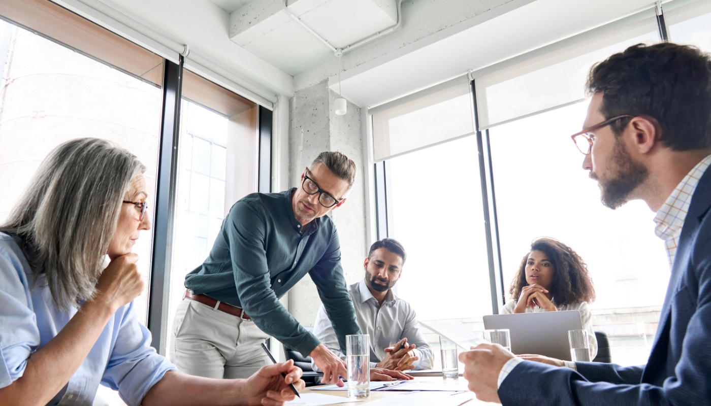 Employees having a meeting in a conference room 