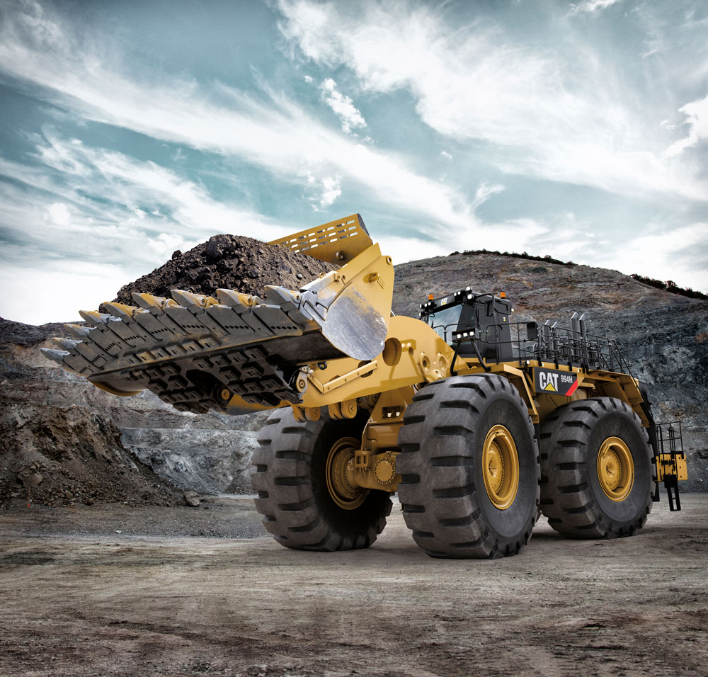 C742281 Large cat bulldozer transporting dirt