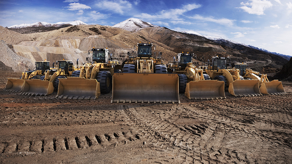 surface-equipment-cta-1 Bulldozers lined up on a site