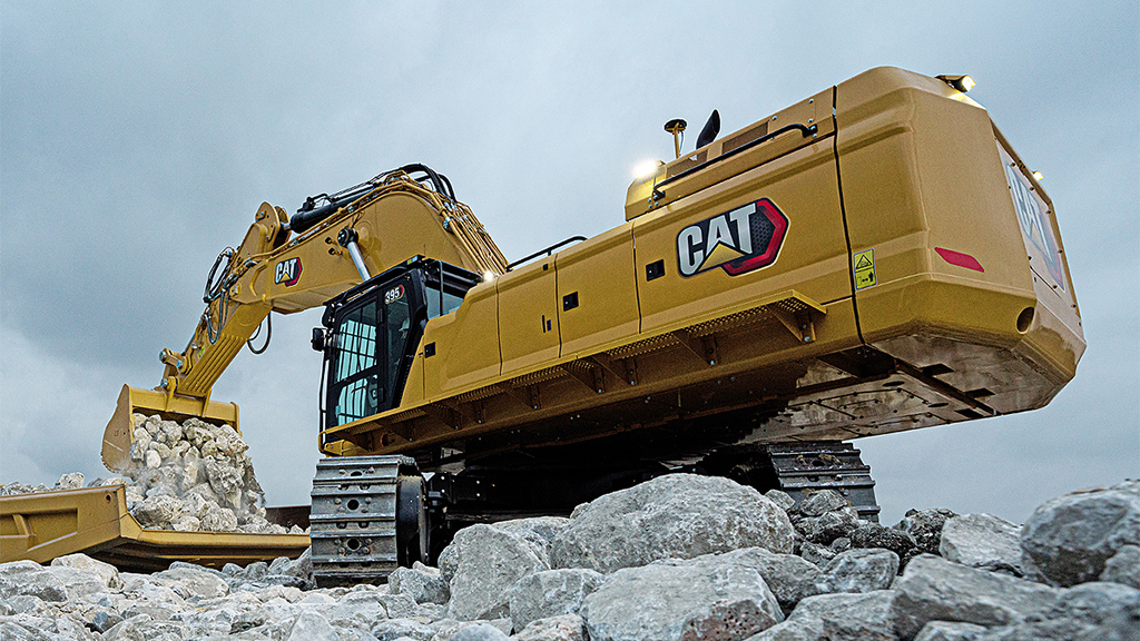 surface-equipment-excavators Cat bulldozer dumping rocks
