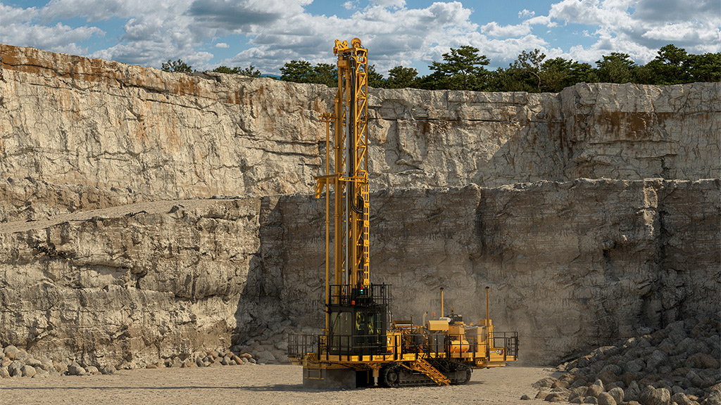 Cat machine drilling a hole into the ground