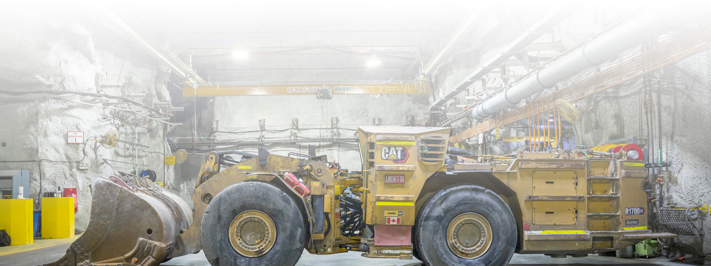 technology-bg-testimonial-DIST background image of large mining bulldozer