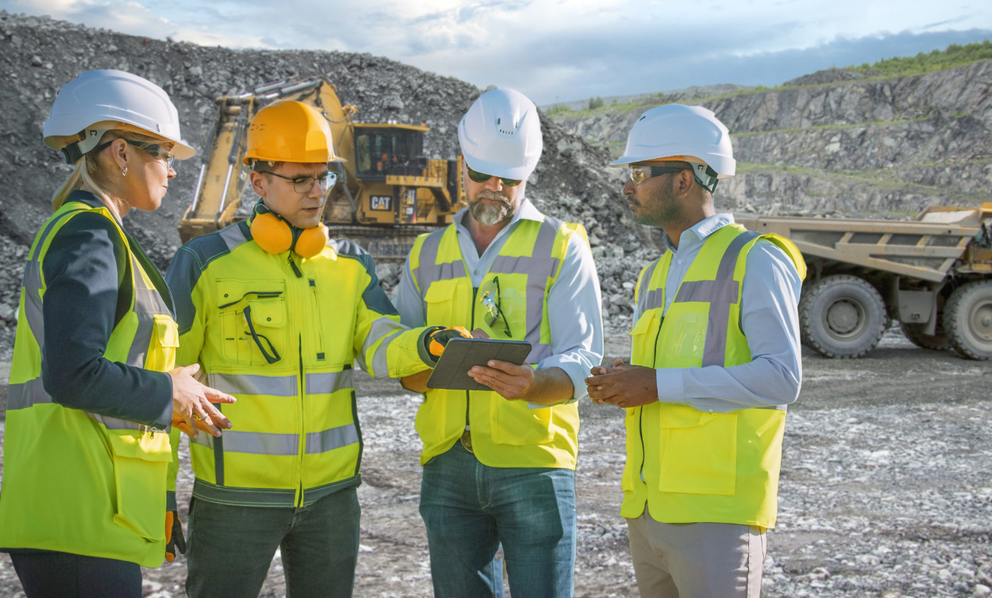 Construction workers deliberating on a construction site 