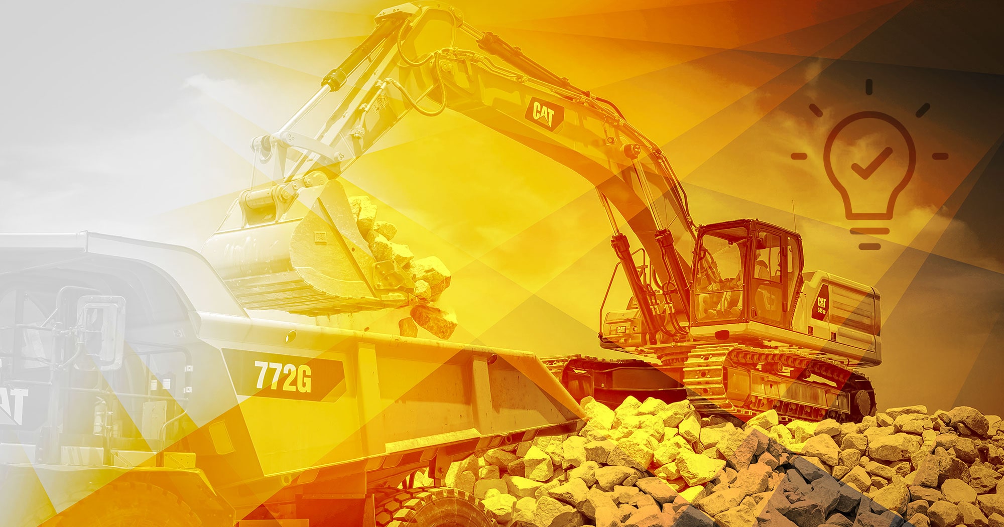 bulldozer putting rocks in the back of a truck