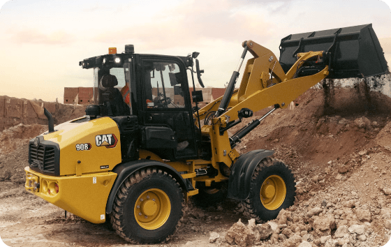 Cat bulldozer push dirt onto a pile